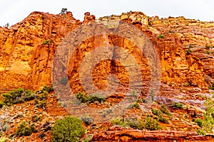 Rain pouring down on the geological formations of the red sandstone buttes surrounding the Chapel of the Holy Cross at Sedona