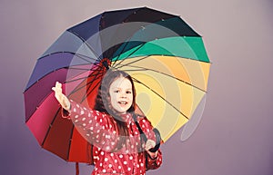 Rain protection. Rainbow. autumn fashion. happy small girl with colorful umbrella. cheerful hipster child in positive