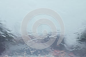 Rain, Rain on the windshield view from inside the car at road way traffic jam, rainy season, rainy storm selective focus