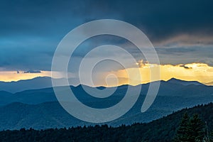 Rain squall creates dramatic light over the Blue Ridge Mountains at sunset