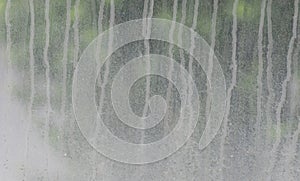 Rain stains on glass background