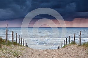 Rain and storm coming from North sea to beach