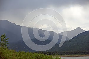 Rain storm coming to lake in Colorado Mountains