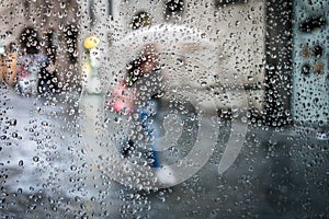 Rain in street and silhouette