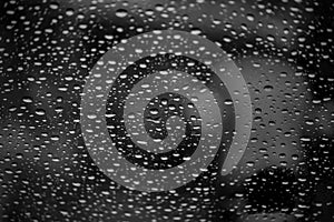 Rain water droplets on a windscreen