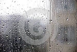 Rain and water drops on window