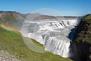 Rainbow above Gullfoss (golden falls) waterfall, Iceland