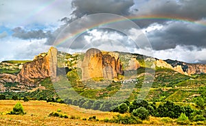 Rainbow above the Mallos de Riglos in Huesca, Spain photo