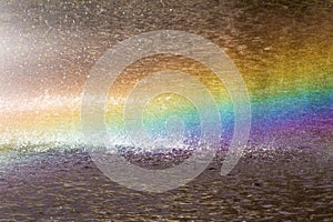 Rainbow above water surface