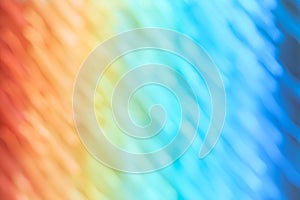 Rainbow abstract background and texture with soft diagonal stripes in the full colors of the spectrum