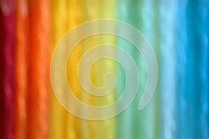 Rainbow abstract background and texture with soft vertical stripes in the full colors of the spectrum