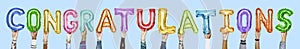 Rainbow alphabet balloons forming the word congratulations photo