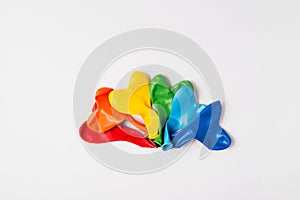 Rainbow balloon hearts for decoration in LGBT colors. Set of isolated heart shaped deflated balloons for greeting card for Pride