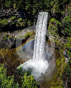 Rainbow at the base of Brandywine Falls at the Sea to Sky Highway between Squamish and Whistler