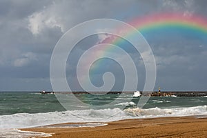 Arcobaleno sul Spiaggia da dopo tempesta 