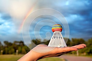 Rainbow birdie on the hand photo