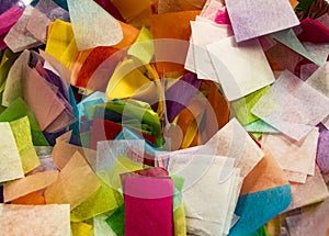 Rainbow bits of square tissue paper