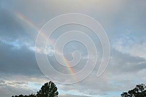 Rainbow in the blue sky after the rain, natural background