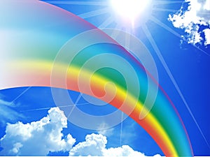 Rainbow on blue sunny sky