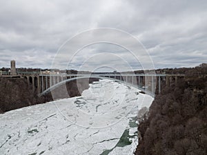 Rainbow bridge at Niagara falls border crossing America and Canada