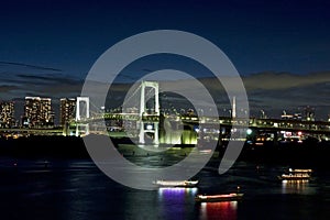 Rainbow bridge and tokyo tower at night