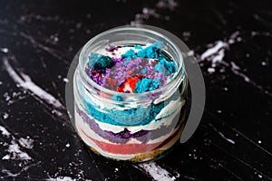 Rainbow Cake Dessert in Glass Jar Flavored with Dragee and Fruits