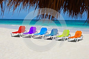 Rainbow chairs on Love Beach, The Bahamas