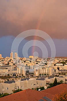 Rainbow in the city center, rainy weather.