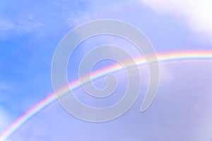 rainbow in the clear blue sky after the rain