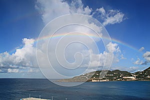 Rainbow through Clouds Over Tropical Island of St. Maarten from Cruise Ship