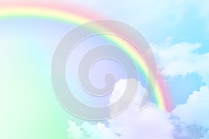 Rainbow in cloudy pastel sky