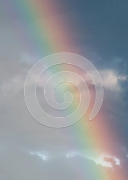 Rainbow in a cloudy sky