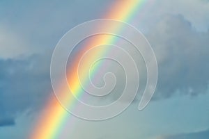 Rainbow in cloudy sky