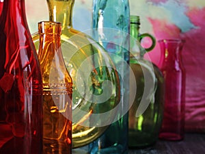 rainbow color bottles .. assorted shapes and sizes
