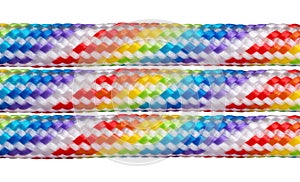 Rainbow colored braided cords isolated on white