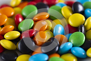 Rainbow-colored candies, multicolored close-up, texture,