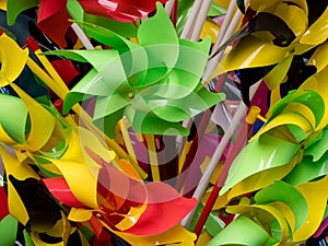 Rainbow colored pinwheels toys. Pinwheel background