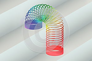 Rainbow colored plastic Slinky