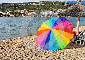 Rainbow-colored umbrella at the bea