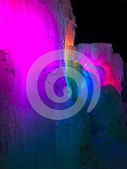 Rainbow colored walls inside ice castle in Lake Geneva, Wisconsin