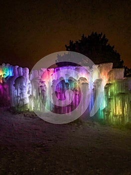 Rainbow colored walls inside ice castle in Lake Geneva, Wisconsin