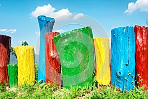 Rainbow-colored wood decoration in garden