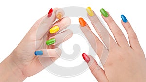 Rainbow colors manicure. Colorful nails. Woman hands after nail salon. Glossy nail polish. Gel or acrylic fake or false nails. Art