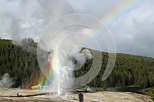 Rainbow colors Old Faithful Geyser Yellowstone National Park, WY