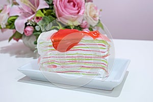 Rainbow crape cake on plate