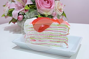 Rainbow crape cake on plate