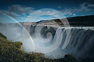 Rainbow at Dettifoss waterfall in Iceland