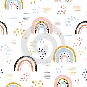 Rainbow, dots and stripes seamless childish pattern. Hand drawn repeat pattern for wrapping, fabrik, textile or paper projects.