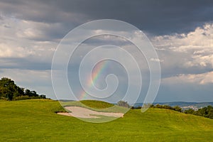 Rainbow on the empty driving range