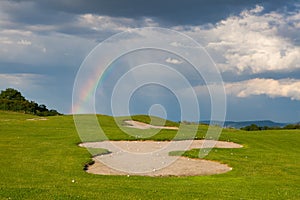 Rainbow on the empty driving range